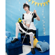 Male model, matthew_aizel, posing in the Maid Outfit (men's). He's propped on a short bookshelf and holding a broom in his hands.