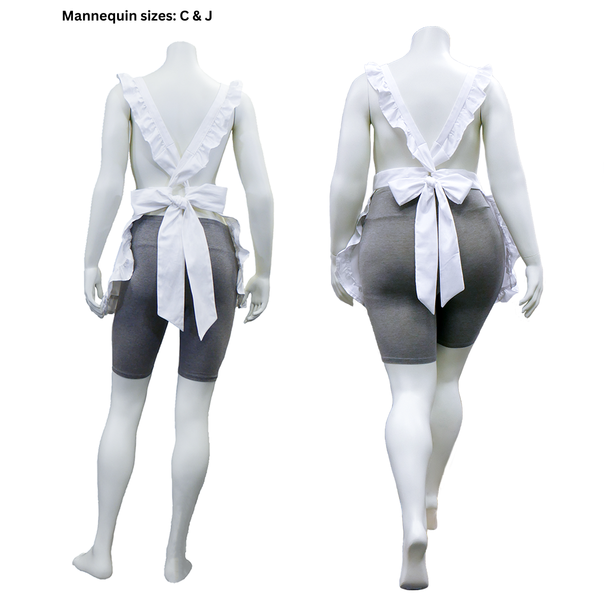 The reverse side of two completed FSCO Aprons (f) on female mannequins in sizes C and J, respectively. Both mannequins feature the criss-cross back and bow tie.