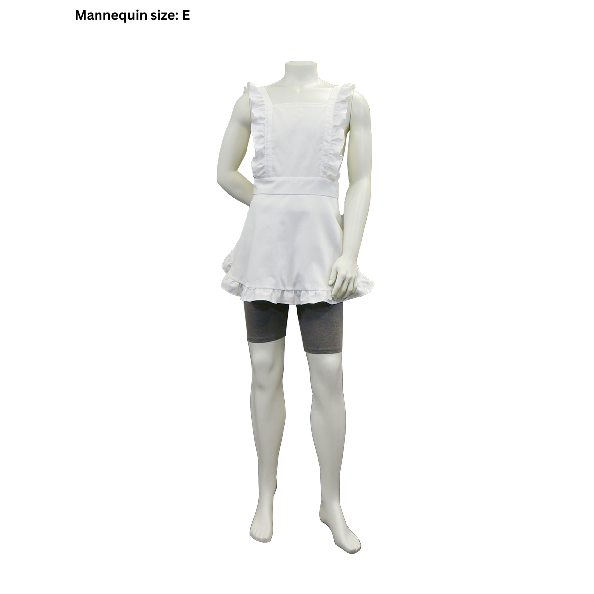 A completed FSCO Apron (m) on a male mannequin in size E. The apron is white with white ruffles. The A-line silhouette of the apron is visible.