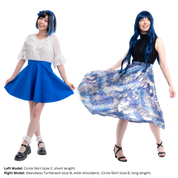Two female size C models posing while wearing the Circle Skirt in both the short and long lengths. The model on the left (short Circle Skirt) is holding the ends of the skirt away from her body. The model on the right (long Circle Skirt) is tossing the skirt to the side.