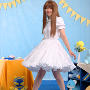 Female model (size C) swaying in the Petticoat, causing the layers of skirt to flare out.