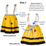 Size J Petticoat front and back view with text and arrows pointing out the 2" wide waistband for sizes I-P, invisible zipper, and tie to create a stylish bow.