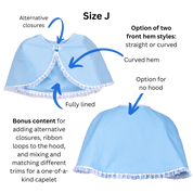 Size J non-hooded Capelet front and back views with text and arrows pointing out the alternative closure options, fully lined interior, and option for no hood.