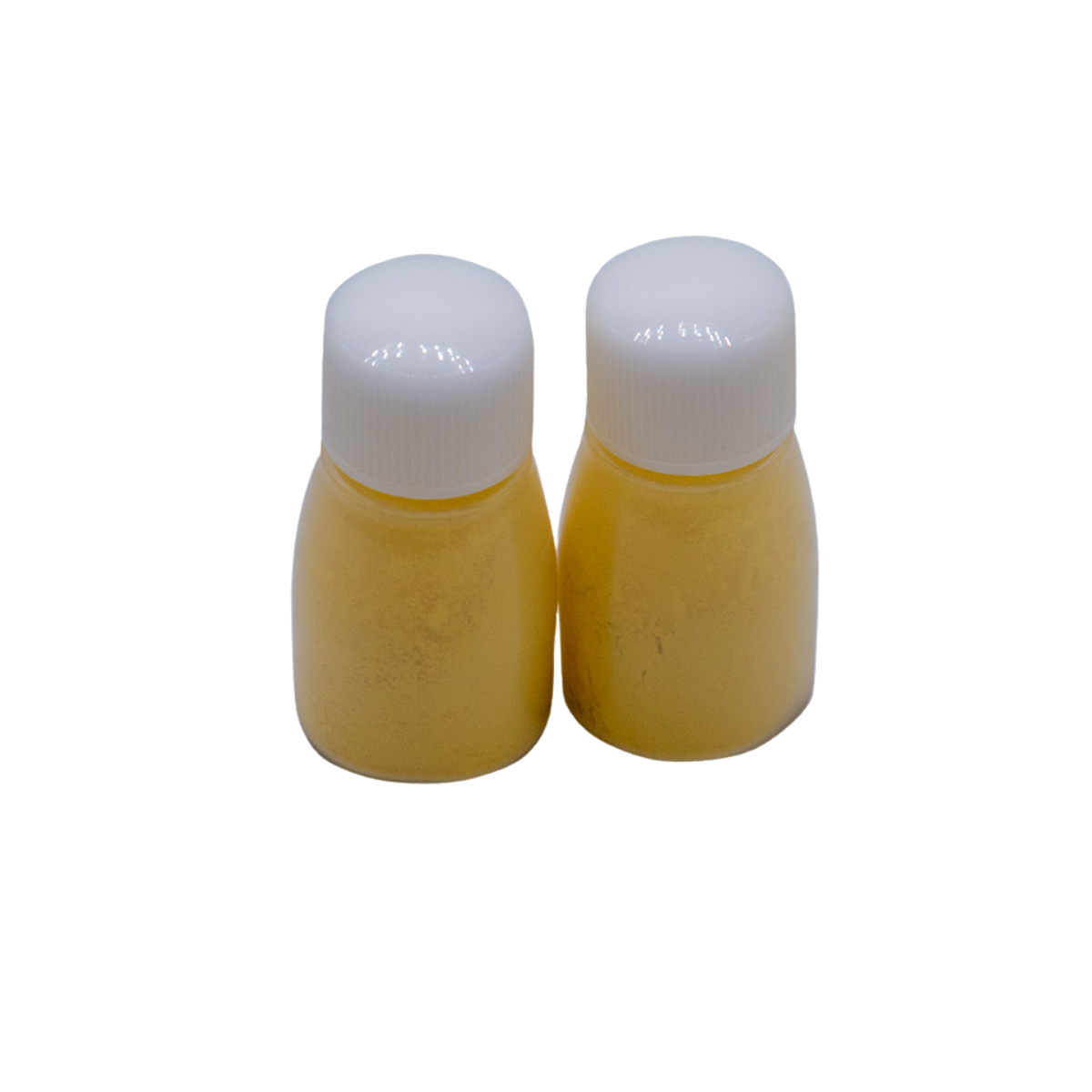 Image of the two bottles of yellow Clover Chaco Refill outside of its packaging. The chalk powder is visible inside the bottle.