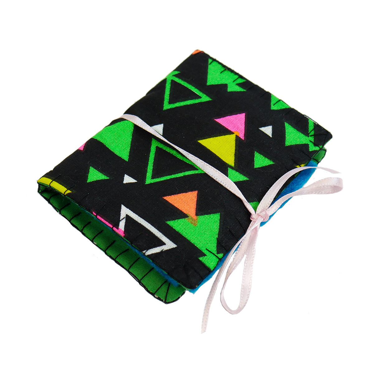 A single completed Needle Book with black and green retro patterned fabric on the outside, bright blue felt pages on the inside, and a thin white ribbon tying it closed around with a bow.